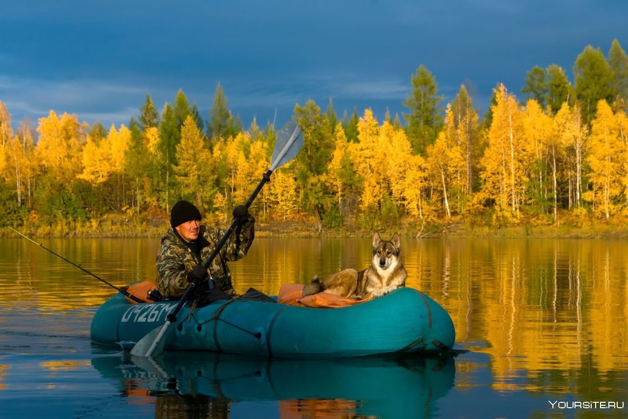 Рыболов на лодке